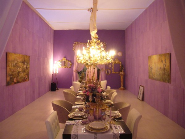 La sala da pranzo della Casa Giardino al Macef con gli affreschi firmati Mariani