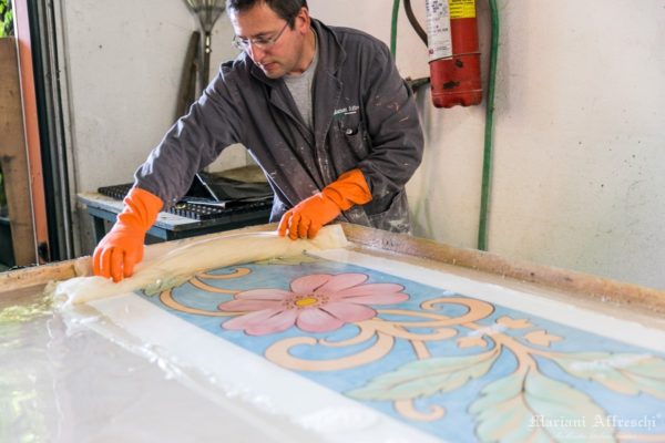 The positive image of the fresco returns on the second canvas. This is known as the Calicot method