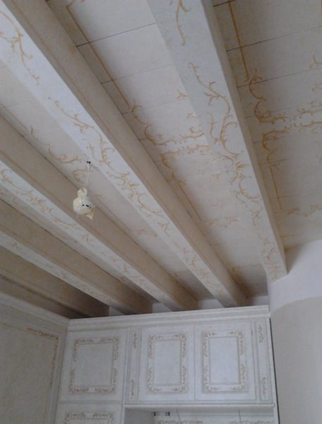 Decorative painting of the wooden ceiling