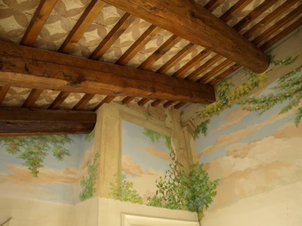 Wall fresco with floral theme for the master bedroom